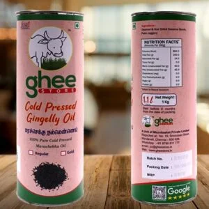 A cylindrical container of cold-pressed gingelly oil, featuring a cow logo and product information in English and another language. The label indicates it is 100% pure, with nutritional facts on one side and details including net weight, batch number, and packing date on the other. The container is placed on a wooden surface.