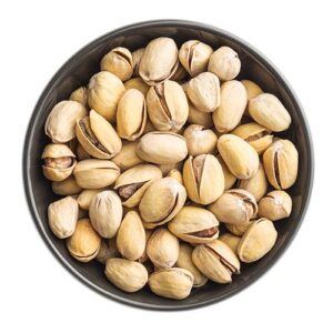 A round metallic bowl filled with whole pistachio nuts, some in their shells and others without, displaying a mix of light beige and brown colours.