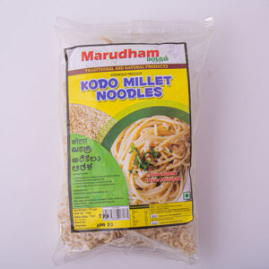 A transparent bag containing Kodo Millet Noodles, with a label featuring bright yellow and green colours, the brand name "Marudham," and additional text in multiple languages, alongside an image of cooked noodles garnished with herbs.