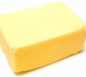 A rectangular block of yellow butter.