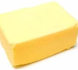 A rectangular block of yellow butter.
